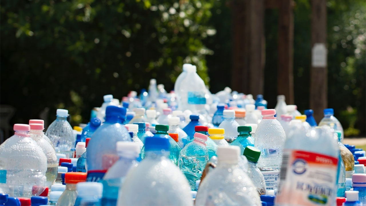 A close up photo of a row of plastic bottles